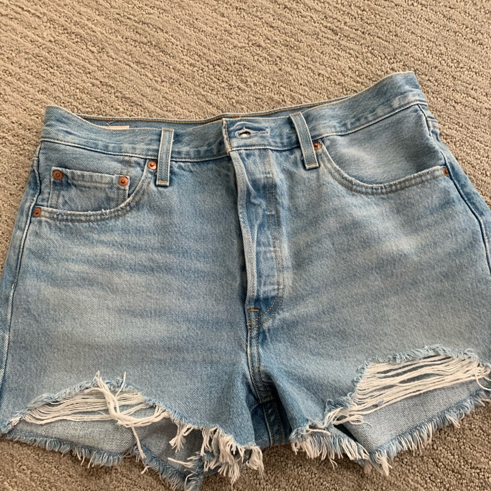 Brand new. Never worn. Size 29 Levi Denim shorts.